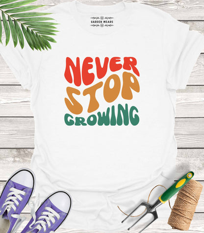 Unisex 100% Cotton T-shirt,  Never Stop Growing