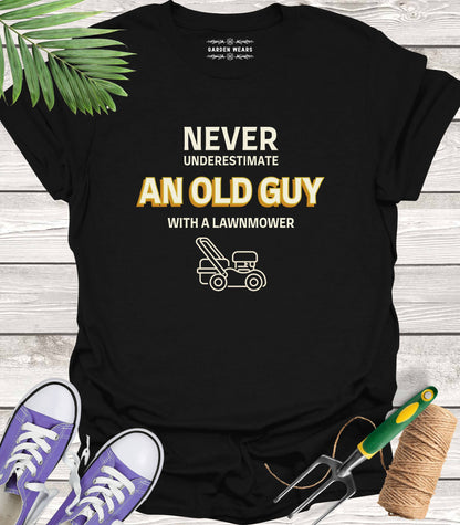 Unisex 100% Cotton T-shirt,  Never Underestimate An Old Guy With A Lawnmower